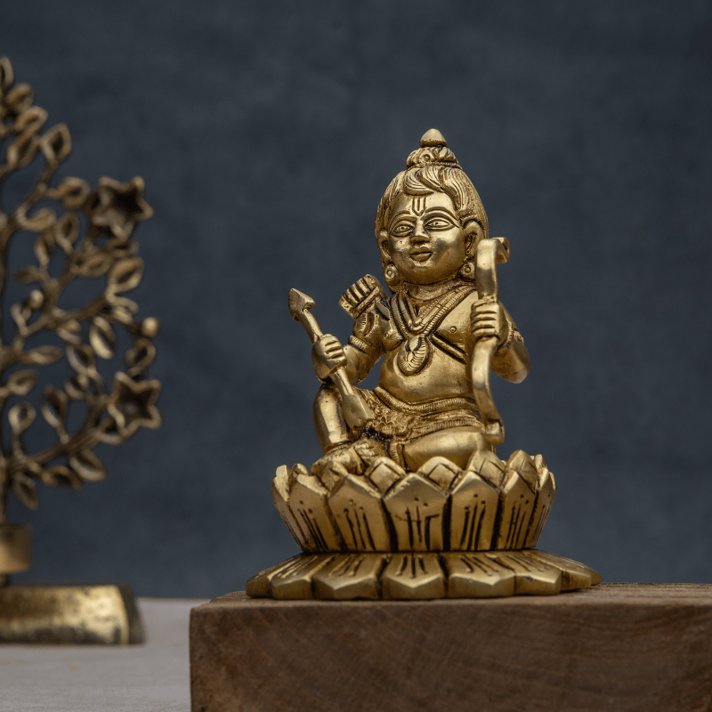 Handcrafted Brass Ram Lala Sitting with Dhanush – Baby Ram Idol for Home Decor