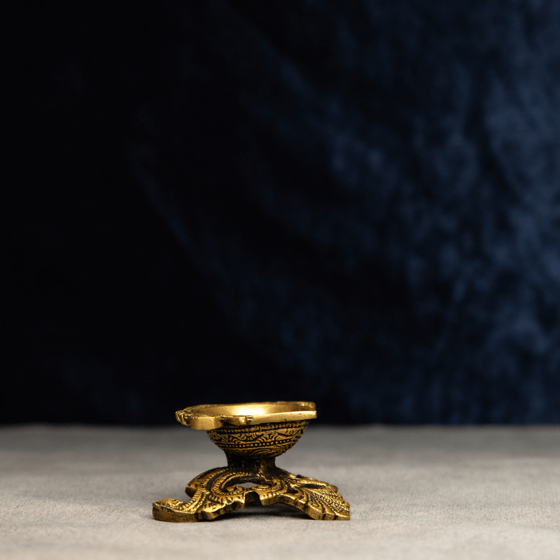 Handcrafted Brass Deepak with Triangular Curved Base – Traditional Oil Lamp for Pooja